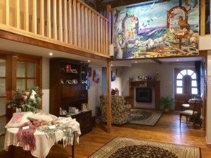 Linhay gallery with Julie's Quilt hanging.