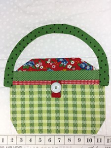 A GREEN SEWING BASKET web